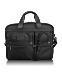 Travel with confidence and tackle terminals with ease. Tumi's expandable checkpoint-friendly T-Pass case goes through security checkpoints hassle-free, allowing you to keep your laptop in the case. The split-opening brief is spacious enough for all of your everyday must-haves with a removable accessories pouch and numerous organizer pockets. Tumi quality assurance warranty. Travel with confidence and tackle terminals with ease. Tumi's expandable checkpoint-friendly T-Pass case goes through security checkpoints hassle-free, allowing you to keep your laptop in the case. The split-opening brief is spacious enough for all of your everyday must-haves with a removable accessories pouch and numerous organizer pockets. Tumi quality assurance warranty.