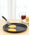 Whip up delicious pancakes and crispy bacon in a flash with the Circulon Elite round griddle. Durable and handy, it features the patented total hard-anodized nonstick food release system, which spreads heat evenly and prevents hot spots, so your food won't burn. Riveted 18/10 stainless steel and flared edges for easy pouring. Silicone comfort grips. Oven safe to 400ºF. Limited lifetime warranty.