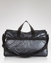 Crafted of durable nylon and sized for carry-on capacity, this versatile LeSportsac weekender is the for-always, go-everywhere, essential.