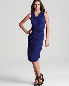 Exude femme luxe in Nola Z's flattering, draped dress. Strappy heels complete for party-perfect style.