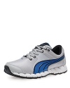 Textured contours and an exaggerated double stripe along the side bring this ultramodern running shoe up to date. The Ever Track outsole sports deep flex grooves for optimal flexibility, and the breathable mesh upper keeps her cool on her toes.