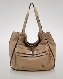 Adopt a free spirited approach to accessorizing with this vintage-inspired hobo from Kooba. In ultra-soft leather and a slouchy shape, it lends daytime looks a distinctive, bohemian vibe. Adopt a free spirited approach to accessorizing with this vintage-inspired hobo from Kooba. In ultra-soft leather and a slouchy shape, it lends daytime looks a distinctive, bohemian vibe.