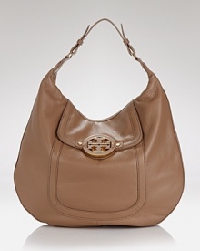 Give them the luxe shoulder. This hobo bag from Tory Burch flaunts an enviable design, crafted from rich pebbled leather with a perfectly proportioned silhouette that goes from desk to dinner with ease. Give them the luxe shoulder. This hobo bag from Tory Burch flaunts an enviable design, crafted from rich pebbled leather with a perfectly proportioned silhouette that goes from desk to dinner with ease.