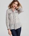 A whimsical dot print decorates this Alcee button-down shirt for '50s-chic. Team the retro style with your skinnies jeans, add a hint of red lipstick and kick up your heels on date night.