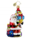 Santa Claus is ready to kick-start Christmas this season with a bunch of brilliantly colored gifts in this hand-painted glass ornament from Christopher Radko.