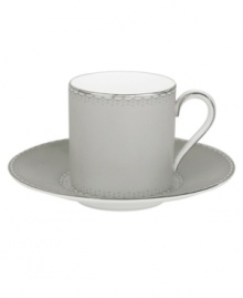 Enjoy a bold brew with this enormously stylish espresso cup and saucer set. From innovative designer Monique Lhullier, it features a platinum-edged tiered scallop pattern on creamy white. Enjoy a bold brew with this enormously stylish espresso cup and saucer set. From innovative designer Monique Lhullier, it features a platinum-edged tiered scallop pattern on creamy white.