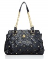 Bold gold pyramid studs accent the diamond-lattice motif of this glam-chic bag from Big Buddha.