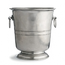 Transport yourself to il bar with this sophistication collection of Italian pewter bar accessories, perfect for at-home entertaining or as gifts. Crafted of the highest quality pewter and finished in a patina that echoes the exquisite finish of centuries past. Clockwise from back left: Champagne bucket, Ice bucket with handle, Wine bucket, Set of 6 coasters. Transport yourself to il bar with this sophistication collection of Italian pewter bar accessories, perfect for at-home entertaining or as gifts. Crafted of the highest quality pewter and finished in a patina that echoes the exquisite finish of centuries past. Clockwise from back left: Champagne bucket, Ice bucket with handle, Wine bucket, Set of 6 coasters.
