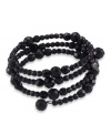 Let this sleek black bracelet coil around your wrist like a snake. Crafted by Carolee, this three row stretch bracelet features faceted jet beads set in hematite-plated mixed metal. Approximate diameter: 2-1/4 inches.