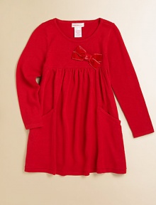 A cozy, cute knit frock with a velveteen bow and front pockets for utility and style.Round necklineLong sleevesPullover styleHigh-waisted with velveteen bowPatch pockets95% viscose/5% spandexHand washImported A cozy, cute knit frock with a velveteen bow and front pockets for utility and style.Round necklineLong sleevesPullover styleHigh-waisted with velveteen bowPatch pockets95% viscose/5% spandexHand washImported