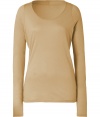 Ground your cool weather casual wardrobe with stylish staples like this light brown long sleeve t-shirt from Closed - Crafted from super-soft, pure cotton and gently distressed for a look of well-worn chic - Long, lean cut, hits below hips - Fitted sleeves and flattering scoop neck - Wear solo or layer with a blazer or pullover and pair with cigarette pants, jeans or A-line skirts