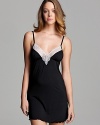 A solid knit chemise with intricate lace detail along neckline and back, a charming look from Honeydew. Style #340811