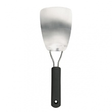 OXO International Large Flexible Turner features a flexible spring-steel head that slides easily beneath delicate foods while keeping them intact. The head is large enough to accommodate fish filets, omelets, crepes and more. Bakers can use this Turner to lift cookies and pastries off a cookie sheet without breaking them. OXO International Large Flexible Turner features a flexible spring-steel head that slides easily beneath delicate foods while keeping them intact. The head is large enough to accommodate fish filets, omelets, crepes and more. Bakers can use this Turner to lift cookies and pastries off a cookie sheet without breaking them.