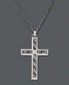 Made of strong metal, this cross necklace symbolizes the ultimate long-lasting gift of faith. Cross pendant crafted with stainless steel and carbide. Featured on a diamond accent curb chain.  Approximate length: 24 inches. Approximate drop: 1-1/2 inches.