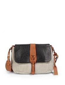 THE LOOKLinen body with contrast cowhide trimTextured lambskin flap with contrast strap and stud closureAdjustable contrast shoulder strapContrast logo ID tagMagnetic flap closureOne zip pocket with zip compartment under the flapOne outside snap pocketProtective metal feetOne inside zip pocketOne inside open pocketInside logo detailTHE MEASUREMENTAdjustable shoulder strap THE LOOKLinen body with contrast cowhide trimTextured lambskin flap with contrast strap and stud closureAdjustable contrast shoulder strapContrast logo ID tagMagnetic flap closureOne zip pocket with zip compartment under the flapOne outside snap pocketProtective metal feetOne inside zip pocketOne inside open pocketInside logo detailTHE MEASUREMENTAdjustable shoulder strap