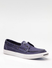 A super-casual spin on the classic boat shoe, now in washed cotton twill with a laceless, slip-on design. Metal rivets Padded insole Rubber sole Imported 