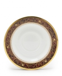 Add drama to your tabletop with this bold pattern from Noritake! Strikingly elegant, this bone china features a rich gold and red brocade border adorned with soft ivory dots and a gold band.