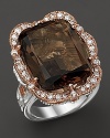 Diamonds, set in sterling silver and 18K. pink gold, frame a cushion cut smoky quartz. By Tacori.