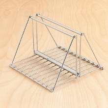 A18/10 stainless steel napkin holder features modern styling, and function. Has easy to carry handle, and weighted center bar to hold napkins in place, but still easy to remove when needed. A18/10 stainless steel napkin holder features modern styling, and function. Has easy to carry handle, and weighted center bar to hold napkins in place, but still easy to remove when needed.