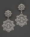 Intricately wrought sterling silver leaves form elegant earrings. By Buccellati.