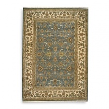 Modeled after the world's most prized antique textiles, this luxuriant Karastan rug lends opulence and heirloom beauty to your home. Surrounded by a light border to add depth and contrast, the stylized pattern depicts lush flora and curvilinear accents. First introduced in 1928, the Original Karastan Collection established the highest standard for traditional Oriental machine woven rugs. Modeled after the world's most prized antique textiles, this luxuriant Karastan rug lends opulence and heirloom beauty to your home. Surrounded by a light border to add depth and contrast, the stylized pattern depicts lush flora and curvilinear accents. First introduced in 1928, the Original Karastan Collection established the highest standard for traditional Oriental machine woven rugs.