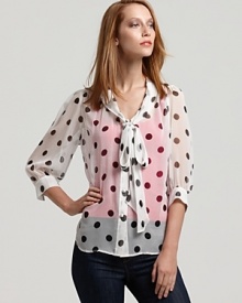 Pretty polka dots on sheer silk make this Karen Kane blouse a ladylike underpinning for jackets or a sweetly stunning partner to a pencil skirt. Finished with a bow, of course.