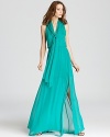 Imbued with a potent hue, this BCBGMAXAZRIA gown is fashioned in gauzy silk for a light-as-air feel.