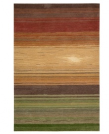 Contemporary scrollwork, detailed Damask and a patchwork of warm, earthy colors form an elegantly constructed look from Nourison. Hand tufted of long polyester fibers for added strength and softness, it creates an ideal accent for any modern room. Contemporary scrollwork, detailed Damask and a patchwork of warm, earthy colors form an elegantly constructed look from Nourison. Hand tufted of long polyester fibers for added strength and softness, it creates an ideal accent for any modern room.