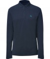 Build the foundations of your everyday staple separates wardrobe with Burberry Brits navy long sleeved cotton polo - Classic collar, partial buttoned front, embroidered logo, side slits, straight cut - Pair with favorite tweed blazers and chinos