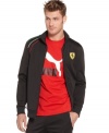 Sealed with the Ferrari stamp of approval, this Puma track jacket infuses your look with the sleek, speed-chasing style of a sports car.