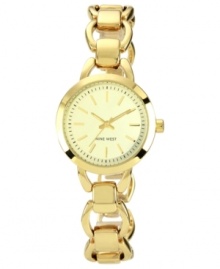 A graceful timepiece in soothing golden tones from Nine West. A graceful timepiece in soothing golden tones from Nine West.
