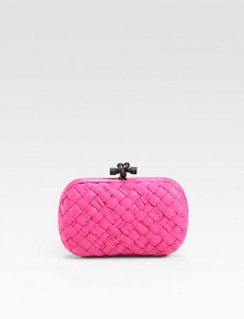 A demure bag of smooth woven leather, topped by a chic knotted clasp.Top clasp closureSuede lining7½W X 4¾H X 3/4DMade in Italy A demure bag of smooth woven leather, topped by a chic knotted clasp.Top clasp closureSuede lining7½W X 4¾H X 3/4DMade in Italy