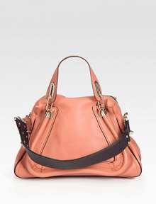 Luxurious calfskin leather with double top handles and goldtone hardware. Double top handles, 5 dropDetachable shoulder strap, 14 dropTop zip closureOne inside zip pocketFully lined15W X 10H X 6DMade in Italy Luxurious calfskin leather with double top handles and goldtone hardware. Double top handles, 5 dropDetachable shoulder strap, 14 dropTop zip closureOne inside zip pocketFully lined15W X 10H X 6DMade in Italy