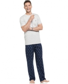 Get ready to relax in the classic, heritage comfort of this coordinating (and super comfortable) pajama t-shirt and pant set from Nautica. Get ready to relax in the classic, heritage comfort of this coordinating (and super comfortable) pajama t-shirt and pant set from Nautica.