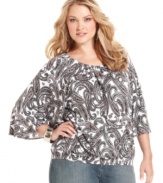 Team your go-to jeans with MICHAEL Michael Kors' plus size peasant top, flaunting a vivid paisley-print! (Clearance)