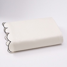 Solid jacquard, 400-thread count flat sheet with scalloped hem detail. Pillowcases feature a French closure. Fitted sheet has elastic all around and an 18 pocket to fit most mattresses.