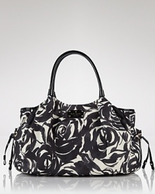 Abstract roses camouflage this baby bag with a grown-up print. Loaded with organizing features, it's as handy as it is chic. By kate spade new york. Abstract roses camouflage this baby bag with a grown-up print. Loaded with organizing features, it's as handy as it is chic. By kate spade new york.