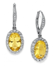 Canary yellow sings in these lever-back drop earrings from Eliot Danori. Crafted from silver-tone brass and cubic zirconia (3 ct. t.w.), and surrounded by sparkling accents, the earrings are a glamorous complement. Approximate drop: 3/4 inches. Canary yellow sings in these lever-back drop earrings from Eliot Danori. Crafted from silver-tone brass and cubic zirconia (3 ct. t.w.), and surrounded by sparkling accents, the earrings are a glamorous complement. Approximate drop: 3/4 inches.