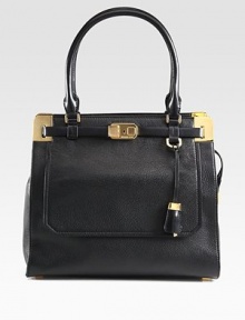 Luxurious pebbled leather in a roomy top-handle carryall, accented with radiant hardware and smooth leather trim.Double leather top handles, 7½ dropTop zip closureProtective metal feetThree inner compartmentsOne outside flap pocketOne inside zip pocketTwo inside open pocketsFully lined13½W X 12H X 6DImported Luxurious pebbled leather in a roomy top-handle carryall, accented with radiant hardware and smooth leather trim.Double leather top handles, 7½ dropTop zip closureProtective metal feetThree inner compartmentsOne outside flap pocketOne inside zip pocketTwo inside open pocketsFully lined13½W X 12H X 6DImported