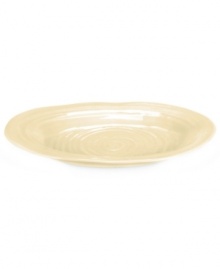 Celebrated chef and writer Sophie Conran introduces dinnerware designed for every step of the meal, from oven to table. A ribbed texture gives this tan platter from Portmeirion the charm of traditional hand-thrown pottery.