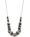 Effortless style that makes accessorizing easy. Match anything with this versatile Nine West necklace that highlights plastic jet and clear beads on a delicate, silver tone mixed metal chain. Approximate length: 18 inches.