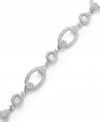 Chic and classic! Eliot Danori's link bracelet may be timeless and traditional, but sparkling crystals and glass accents give it a glamorous new look. Set in silver tone mixed metal. Approximate length: 7-1/4 inches.