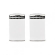 These salt and pepper shakers translate Kate Spade's signature contrast stitching with simple black banding and fine white dots. These salt and pepper shakers translate Kate Spade's signature contrast stitching with simple black banding and fine white dots.