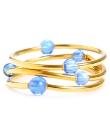 Add a sweet pop of color in threes. Kenneth Cole New York's three bangle set features shimmery blue glass beads and a gold-plated mixed metal setting. Bracelets stretch to fit wrist. Approximate diameter: 2-1/2 inches. Add a sweet pop of color in threes. Kenneth Cole New York's three bangle set features shimmery blue glass beads and a gold-plated mixed metal setting. Bracelets stretch to fit wrist. Approximate diameter: 2-1/2 inches.