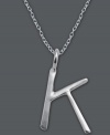 The perfect personalized gift. A polished sterling silver pendant features the letter K with a chic asymmetrical shape. Comes with a matching chain. Approximate length: 18 inches. Approximate drop: 7/8 inch.