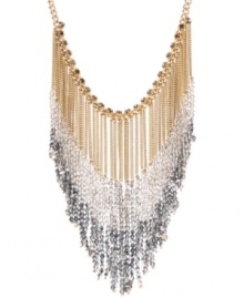 Fabulous fringe! Chic chains and ombre silver tone beading stand out on this stunning statement necklace from Kenneth Cole New York. Further embellished with sparkling crystals, it's crafted in gold tone mixed metal. Approximate length: 17 inches + 3-inch extender. Approximate drop: 4-1/2 inches.