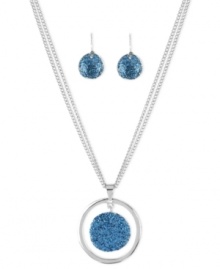 Feeling the blue. Kenneth Cole New York puts you in a good mood with this pendant and drop earrings set. The necklace is crafted from silver-tone mixed metal with a blue glitter disc in the pendant and a pair of drop earrings to match. Items come packaged in a signature Kenneth Cole New York Gift Box. Approximate length: 16 inches + 3-inch extender. Approximate pendant drop: 1-1/2 inches. Approximate earrings drop: 3/4 inch.