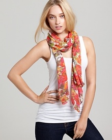Warm up your spring ensemble with a light and airy scarf featuring a gorgeous floral print. Warm up your spring ensemble with a light and airy scarf featuring a gorgeous floral print.