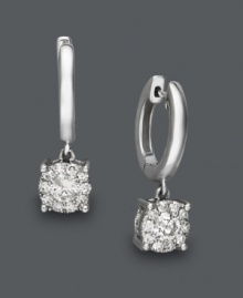 When you can't get enough of your classic hoop earrings, mix it up with a little sparkle. Round-cut diamond drops (1/2 ct. t.w.) light up this traditional look. Crafted in 14k white gold. Approximate drop: 16 mm. When you can't get enough of your classic hoop earrings, mix it up with a little sparkle. Round-cut diamond drops (1/2 ct. t.w.) light up this traditional look. Crafted in 14k white gold. Approximate drop: 16 mm.