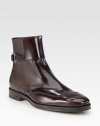 Spazzolato leather wingtip chelsea boot with side gancini strap ornament.Leather upperLeather liningPadded insoleLeather soleMade in Italy